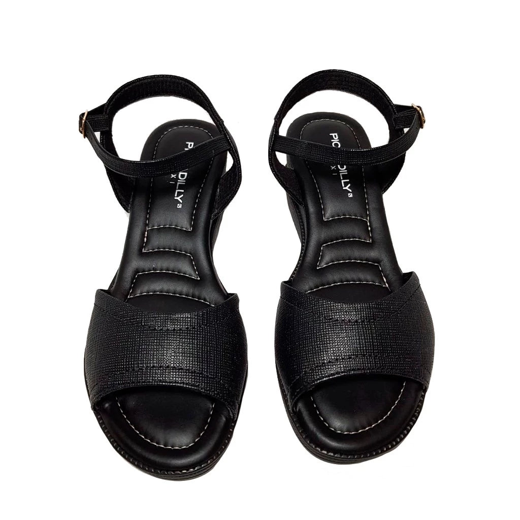 Piccadilly high-heel sandal in black, featuring a soft, curshuined insole. includes an adjustable ankle buckle, ensuring elegance and a comfortable fit.