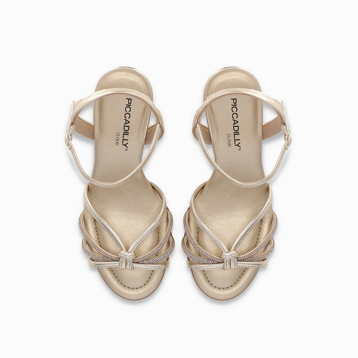 High heel Piccadilly sandal, gold color with adjustable buckle, upper straps featuring a rhinestone knot detail.
