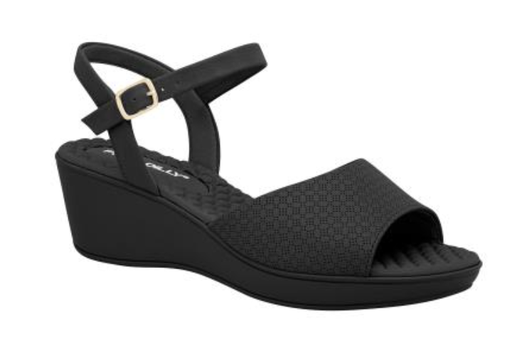 Piccadilly sandal with medium flat heel in black featuring a soft, cushioned insole. it has an adjustable buckle at the heel.