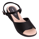 Flart-heeled Piccadilly sandal in black with a beige sole, adjustable buckle, and open uppe.