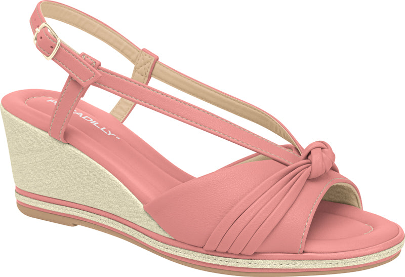 Pink wedges sandal by Piccadilly, featuring an adjustable  strap with a gold  side buckle, front knot detail, and a sole with white and pink stripes.