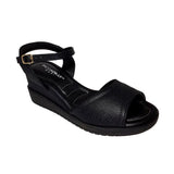 Piccadilly high-heel sandal in black, featuring a soft, curshuined insole. includes an adjustable  ankle buckle, ensuring elegance and a comfortable  fit. 