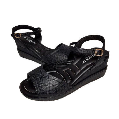 Piccadilly high-heel sandal in black, featuring a soft, curshuined insole. includes an adjustable  ankle buckle, ensuring elegance and a comfortable  fit. 