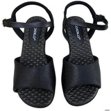 Piccadilly sandal with medium flat heel in black featuring a soft, cushioned insole. it has an adjustable  buckle at the heel.